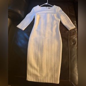 White midi body contouring dress. Size medium. Barely worn.